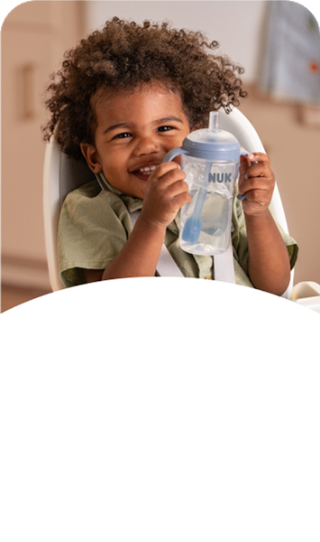 [Translate to Czech (Reborn) nuk.cz:] Baby with Learner Straw