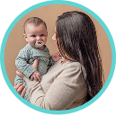 [Translate to Czech (Reborn):] Mother with Baby and soother