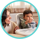 [Translate to Czech (Reborn):] Mother with Baby and straw bottle