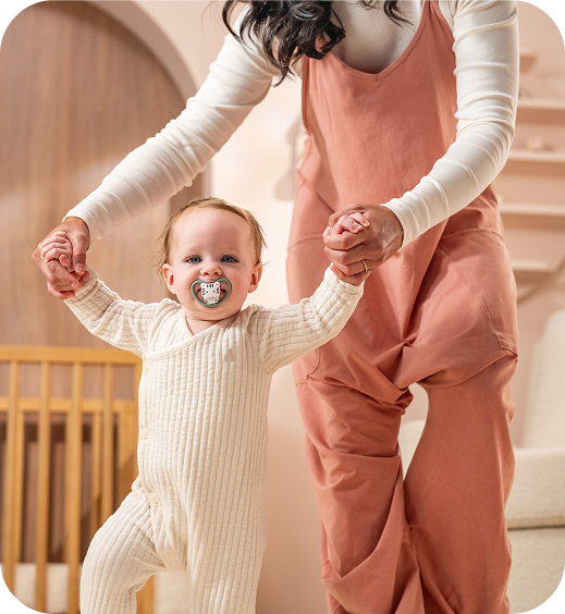 [Translate to Czech (Reborn):] Baby with soother