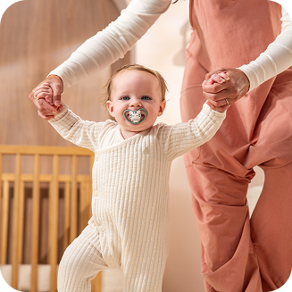 [Translate to Czech (Reborn):] Baby with soother