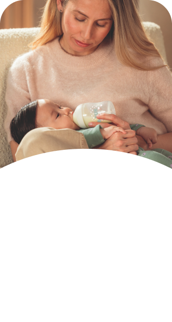 [Translate to Czech (Reborn) nuk.cz:] Mother with Baby and Baby bottle