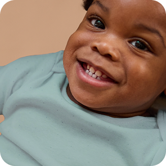 [Translate to Czech (Reborn) nuk.cz:] Baby smiling