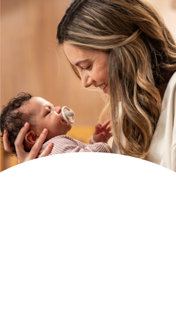 [Translate to Czech (Reborn) nuk.cz:] Mother with baby and soother