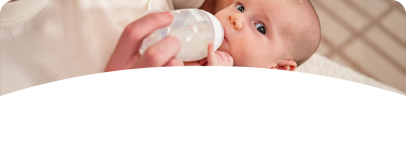 [Translate to Czech (Reborn) nuk.cz:] Baby with Babybottle