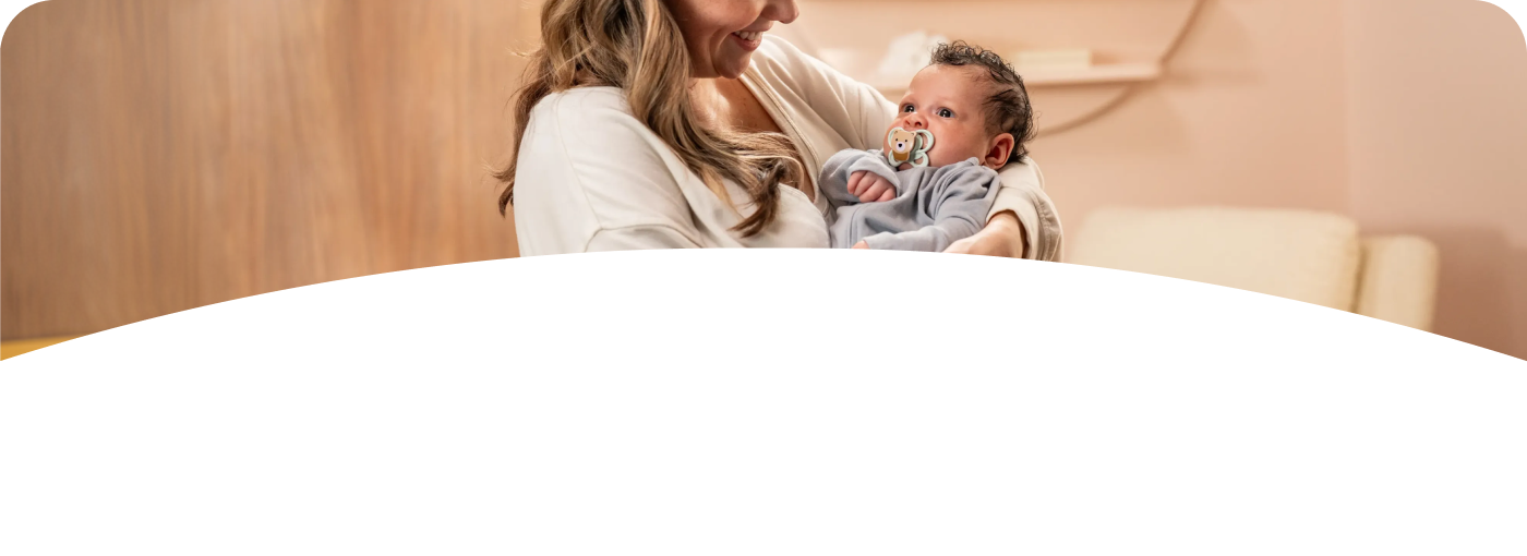 [Translate to Czech (Reborn) nuk.cz:] Mother with baby and soother
