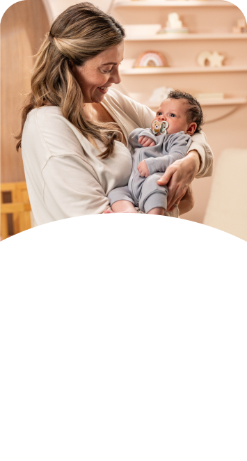 [Translate to Czech (Reborn) nuk.cz:] Mother with baby and soother