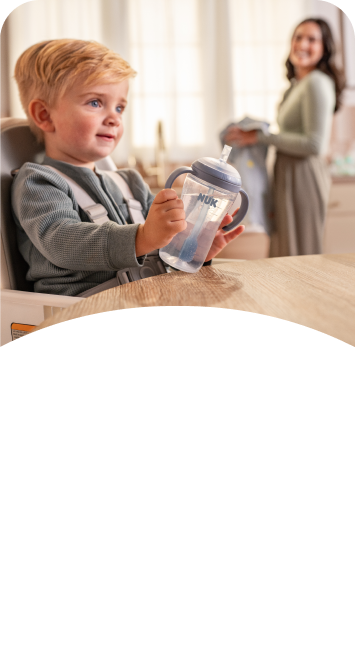 [Translate to Czech (Reborn) nuk.cz:] Baby with Learner Bottle Straw