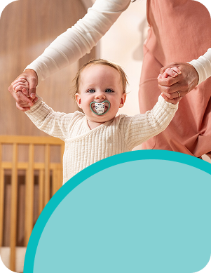 [Translate to Czech (Reborn):] Baby with soother