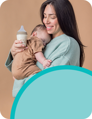 [Translate to Czech (Reborn):] Mother with Baby and Baby bottle