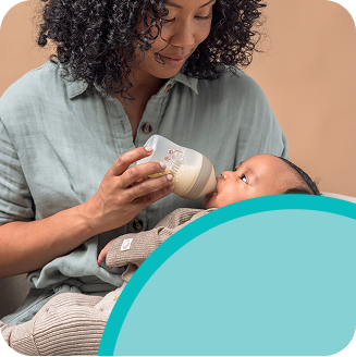 [Translate to Czech (Reborn) nuk.cz:] Mother with Baby and Babybottle