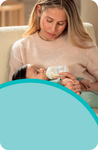 [Translate to Czech (Reborn) nuk.cz:] Mother with Baby and baby bottle